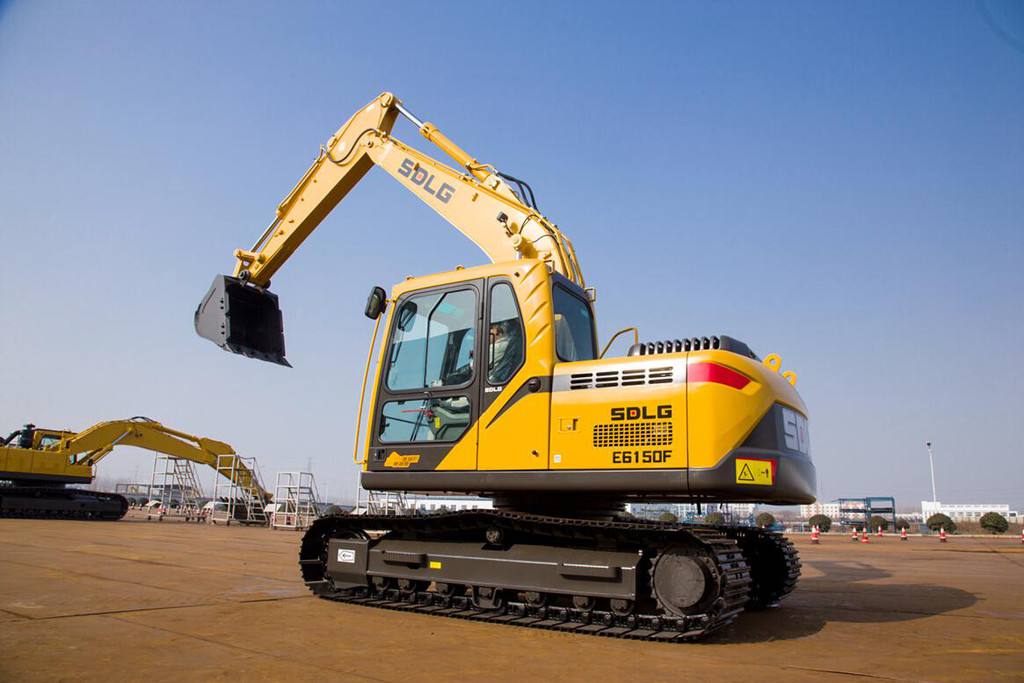 What are the main components of the excavator chassis?